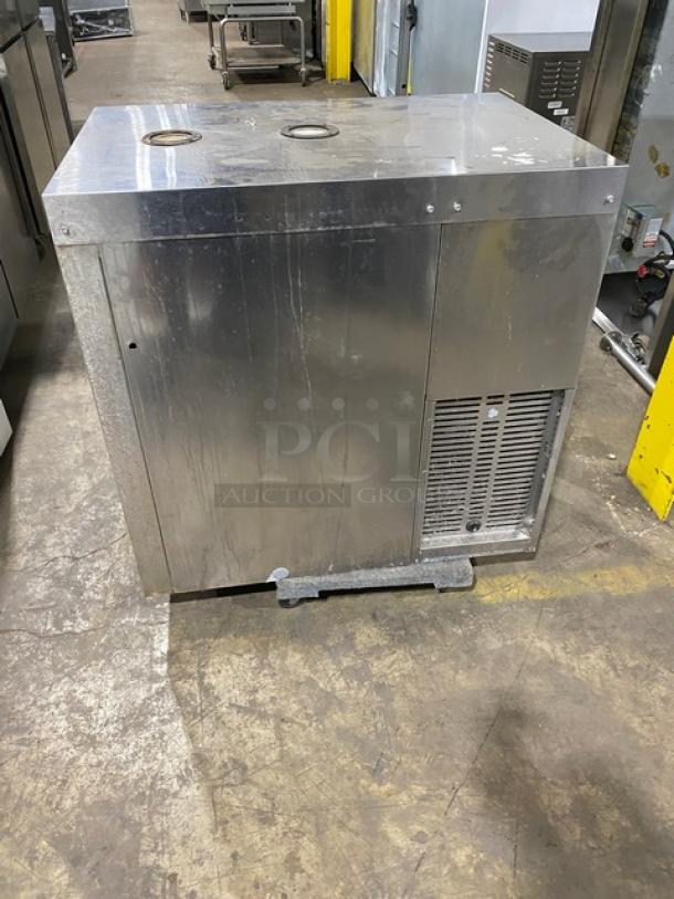 Perlick commercial stainless steel dual-zone back bar storage cabinet, model DZS36T1, showing moderate wear.