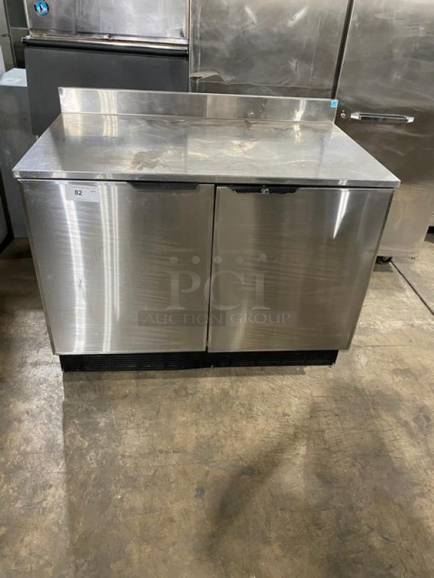 Duke stainless steel 2-door refrigerated worktop cabinet, Energy Star certified, Model RUF48M, with poly coated wire racks and backsplash.