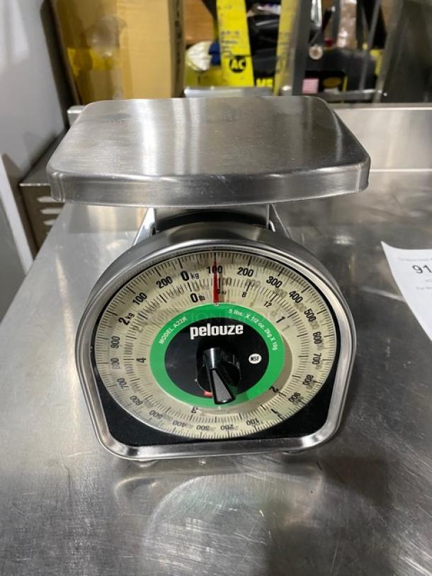 Brand new Rubbermaid Pelouze A22R stainless steel 5 lb. portion control scale with dual read dial. Model A22R SN: 0002389.