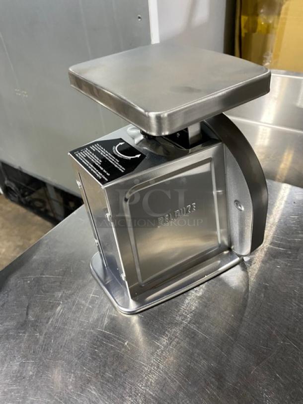 Brand new Rubbermaid Pelouze A22R stainless steel 5 lb. portion control scale with dual read dial, in pristine condition.