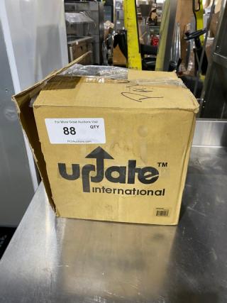 Brand new Update International stainless steel 40 lb. countertop scale, model UPS-840, with 8" analog dial in original box.