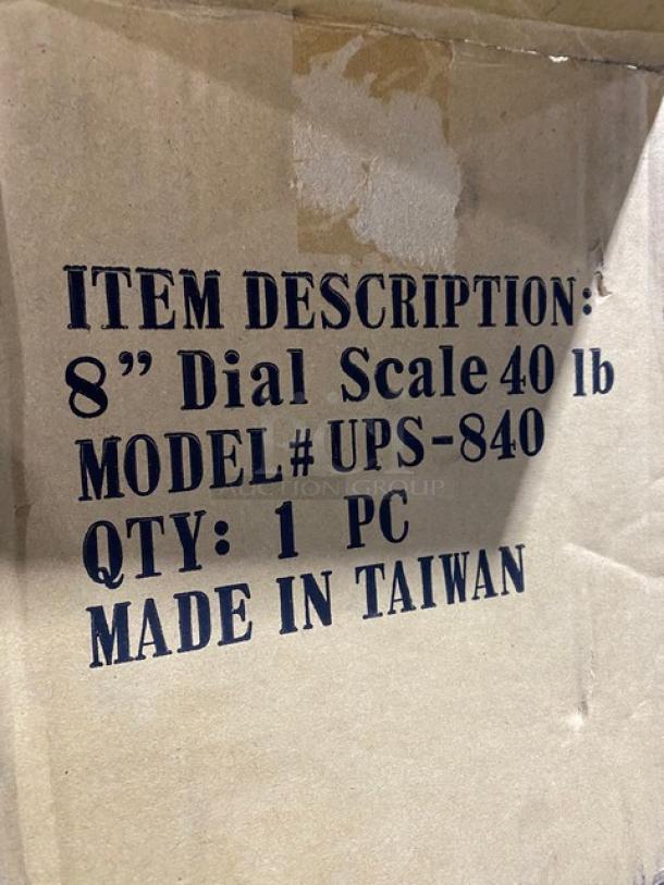 Update International UPS840 Commercial Stainless Steel 40 Lb. Countertop Scale, new, with 8" analog dial, made in Taiwan.