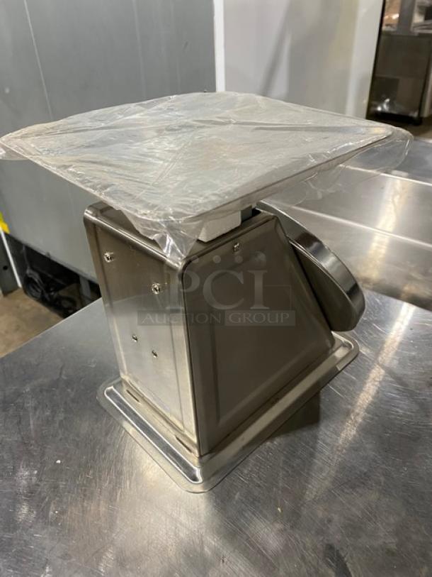 Brand new Update International 40 lb countertop scale, model UPS840, in stainless steel with 8" analog dial.