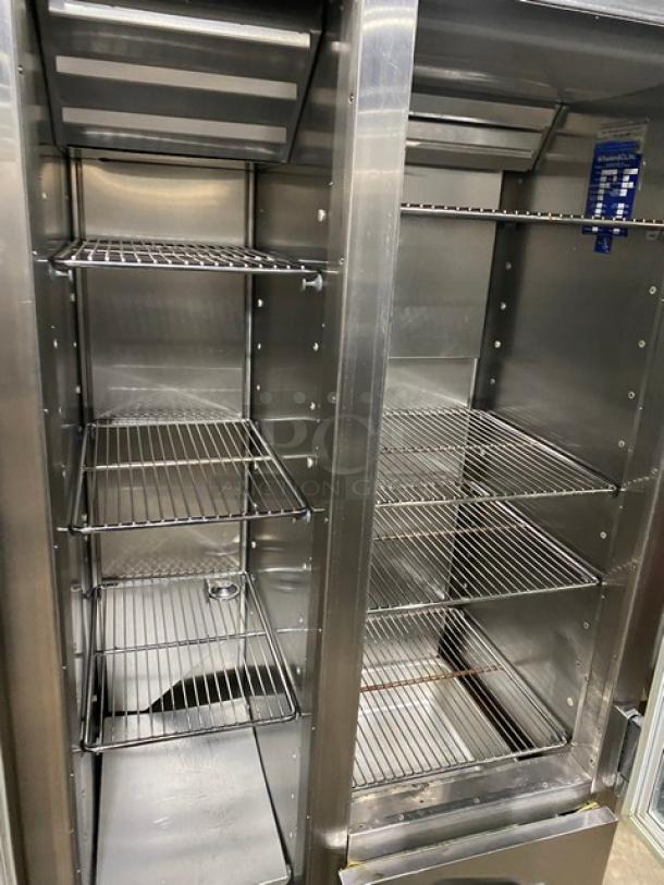 Traulsen stainless steel 2-door/3-drawer refrigerator/freezer combo model URS36DT with chrome wire racks.