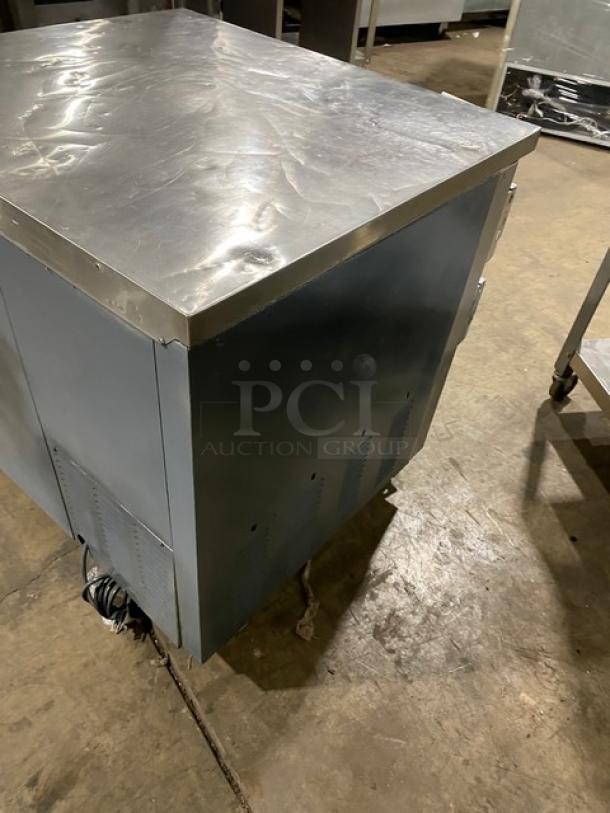 Leader LB36SC stainless steel refrigerated lowboy with two doors, wired rack, and casters. Model: LB36 S/C SN: PT010646a.