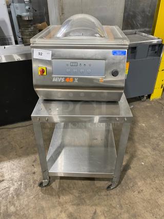 Minipack-Torre MV45X vacuum sealer, like new, with single undershelf cart. Stainless steel, on casters, 120V.