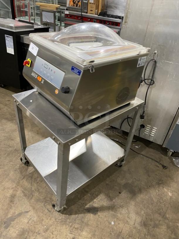 Minipack-Torre MV45X vacuum sealer, like new, on stainless steel stand with casters, 120V, commercial grade.