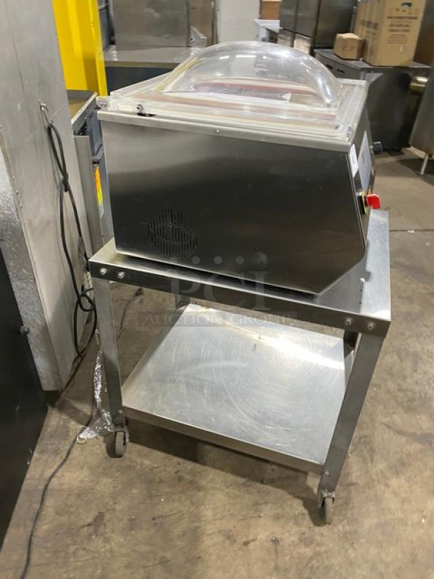 Minipack-Torre MV45X vacuum sealer on casters with stainless steel stand, like new, 120V, single undershelf, no box.