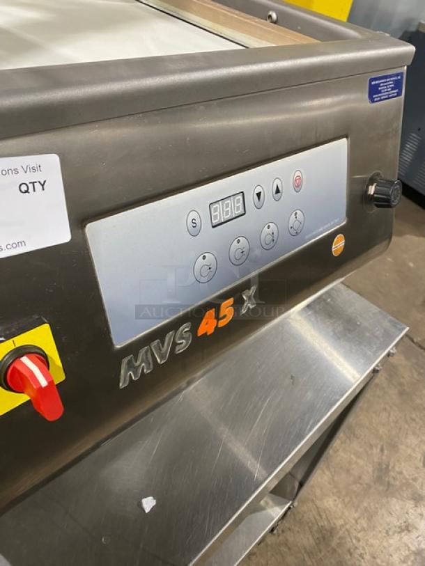 Minipack-Torre MV45X stainless steel vacuum sealer, like new, 120V, with controls, on a single undershelf stand, on casters.