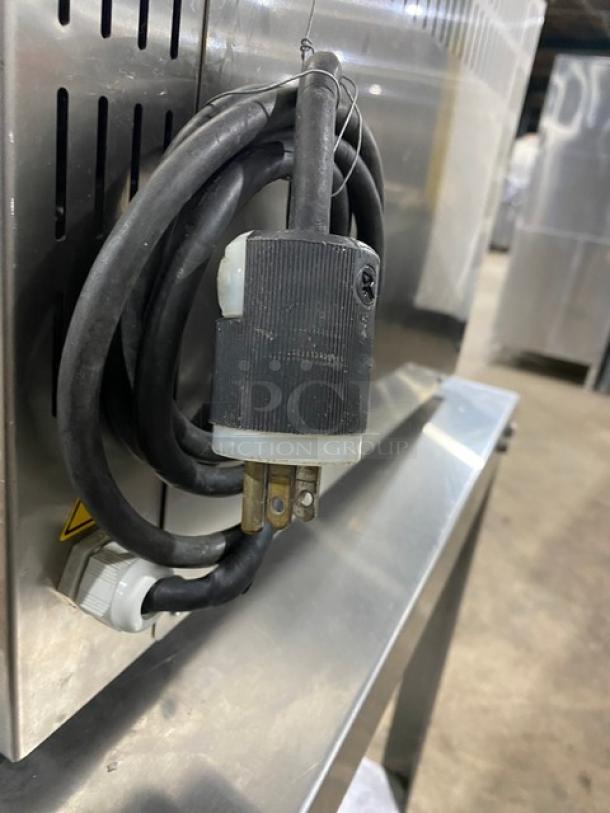 Minipack-Torre MV45X stainless steel vacuum sealer, like new, countertop model on casters, 120V plug shown.