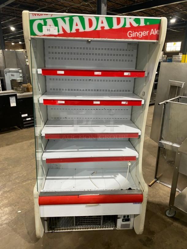 Igloo Canada Dry style refrigerated display case, multi-tier, white, 115V, visible wear, ideal for grab-n-go merchandising.