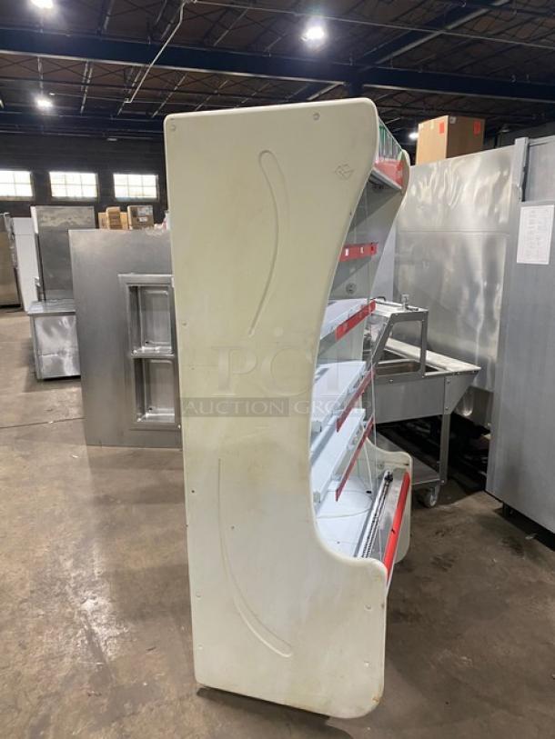 Igloo Canada Dry Style white multi-tier refrigerated open merchandiser display case, 115V, good condition.