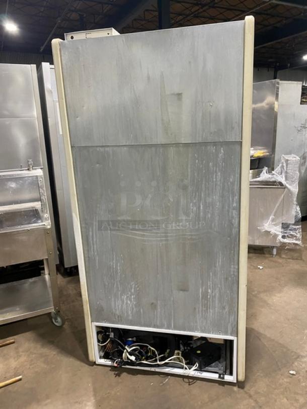 Igloo Canada Dry style white multi-tier refrigerated open merchandiser display case, 115V, back view, used condition.