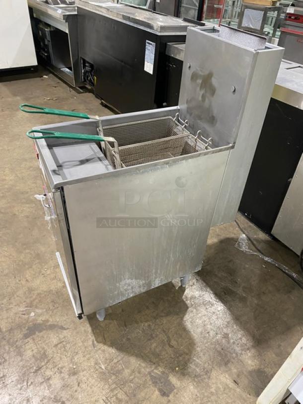 Pitco Frialator 40S deep fat fryer in stainless steel, liquid propane, 40 lb. capacity, with backsplash, fry baskets, on legs.