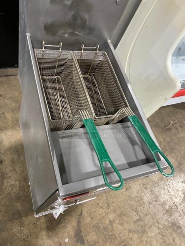 Pitco Frialator 40S commercial fryer, stainless steel, 40 lb. capacity, liquid propane, with backsplash and fry baskets.