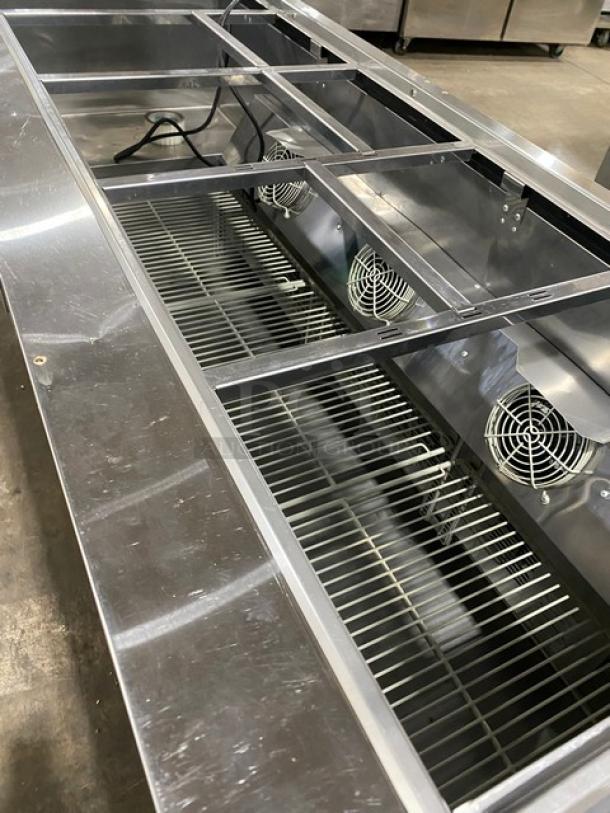 Turbo Air JBT-72-N stainless steel 3-door cold food display, includes sneeze guard, wire racks, on casters, 115V.