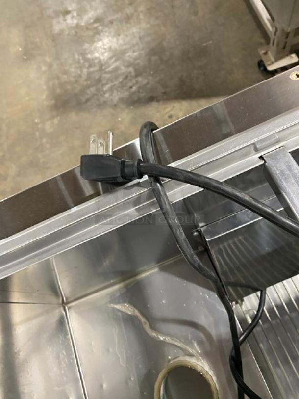 Turbo Air JBT-72-N commercial stainless steel refrigerated buffet table plug and interior, including wiring and metal surface details.