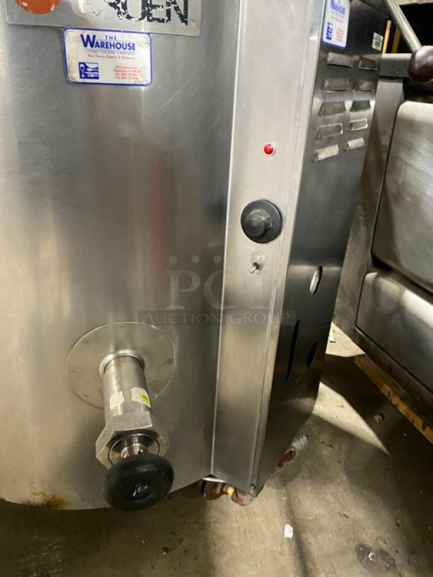 Groen AH140 stainless steel steam kettle, natural gas, 40 lb capacity, stationary, 115V, on legs, with control panel.