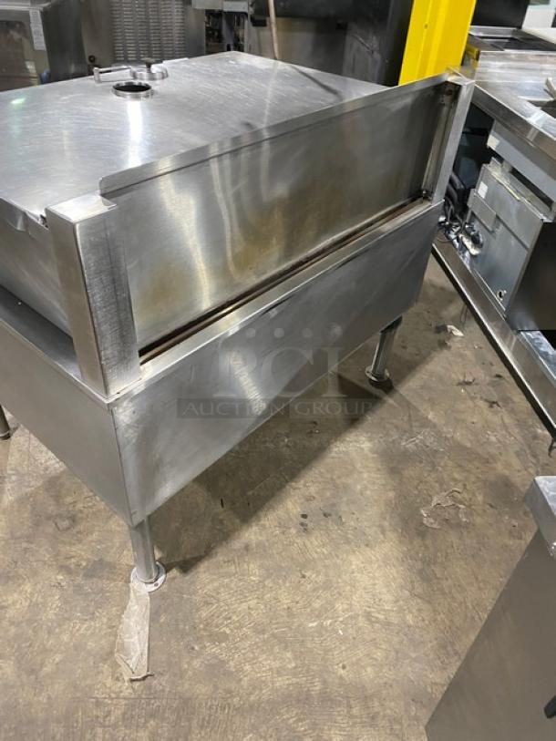 Cleveland Range stainless steel electric tilt braising pan with single spout faucet; excellent condition; mounted on legs.