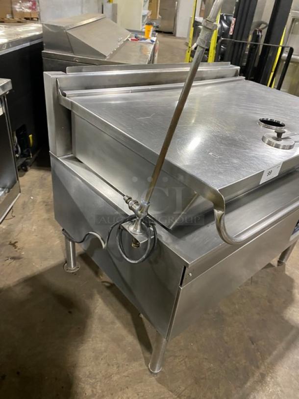 Cleveland Range stainless steel electric tilt braising pan with single spout faucet on legs. Used, good condition.