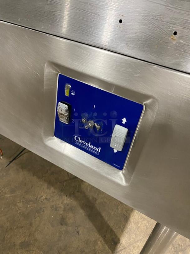 Cleveland Range commercial stainless steel electric tilt skillet with a single spout faucet, on legs, control panel visible.