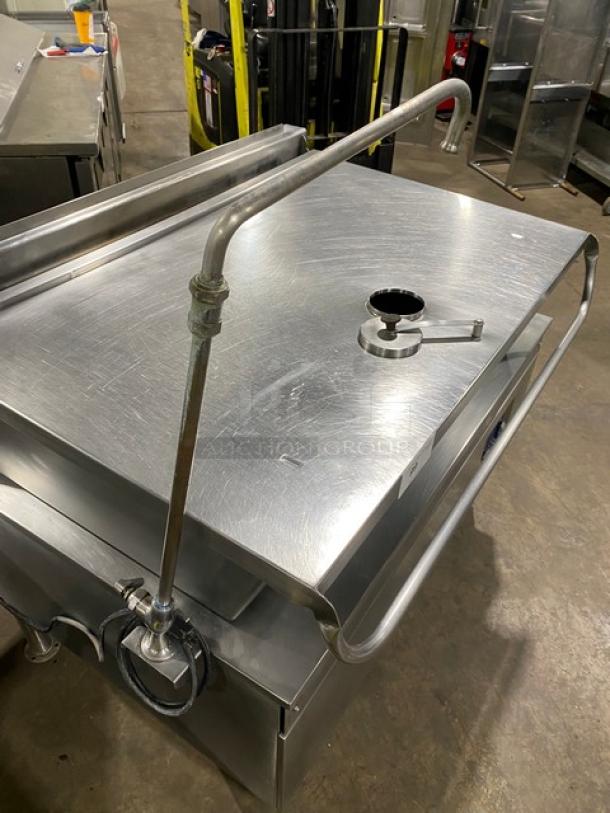 Cleveland Range stainless steel electric tilt braising pan with single spout faucet; commercial-grade, on legs, excellent condition.