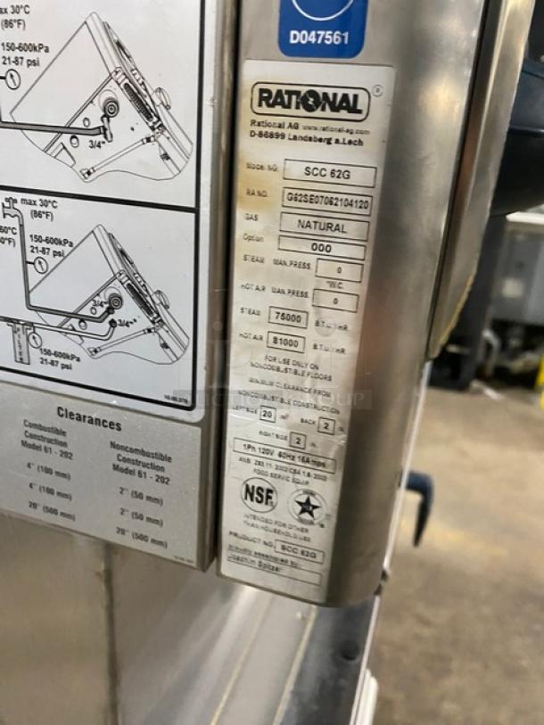 Rational SelfCooking Center SCC62G stainless steel double-stacked combi oven, natural gas powered, with wired racks and blue gas connector hose, Model SCC62G, serial numbers G62SE07062104120/G62SE07062104119, 120V 1 Phase, NSF certified.