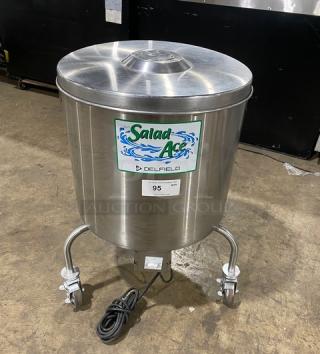 Delfield SALD-1 stainless steel 20-gal salad dryer, electric-powered, on casters, with visible brand labeling and power cord.
