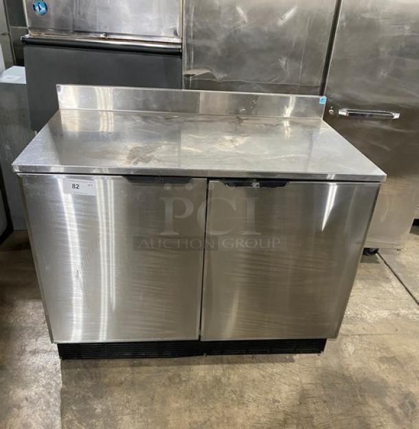 Duke RUF-48M stainless steel 2-door refrigerated worktop back bar cabinet with backsplash, poly-coated wire racks, Energy Star certified.