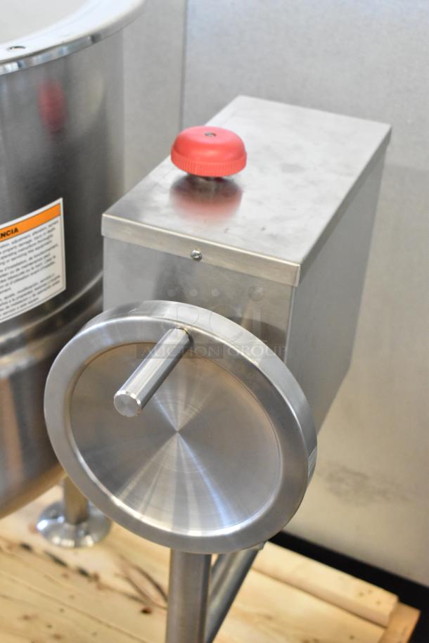 Cleveland KDL-25-T stainless steel 25-gallon tilting steam kettle with red knob, scratch and dent condition.