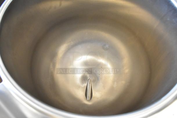 Cleveland KDL-25-T stainless steel 25-gallon tilting steam kettle, scratch and dent, interior view, brand new condition.