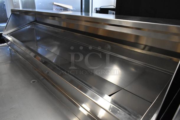 Delfield stainless steel commercial prep table with commercial casters, 115 volts, 1 phase, excellent condition.