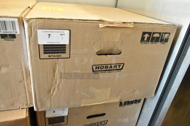 Cardboard box labeled Hobart, containing a new scratch and dent commercial countertop food portioning scale, model HTi.