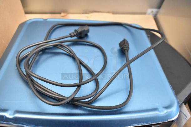 Brand new Hobart HTi metal countertop food portioning scale. Scratch and dent condition, 120/208-240V, 1 phase.