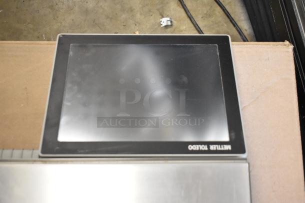 Mettler Toledo UCCW metal food portioning scale, countertop model with touchscreen. Voltage: 100-240V, 1 Phase.