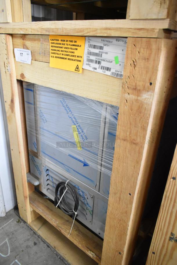 BRAND NEW BKI 52473-1 stainless steel meat freezer, crated, on commercial casters, 115V, 1 Phase, caution label visible.