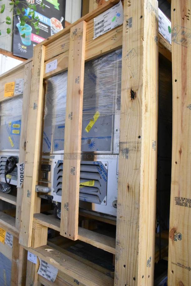 BRAND NEW 2022 BKI 52473-1 stainless steel commercial meat freezer, crated, on casters, 115V, 1 phase, labeled for shipping.