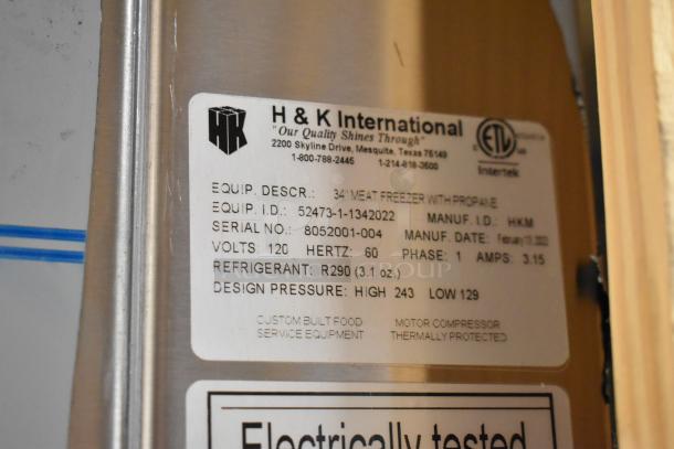 2022 BKI 52473-1 stainless steel commercial meat freezer label in crate, showing specs: 115 volts, 1 phase.
