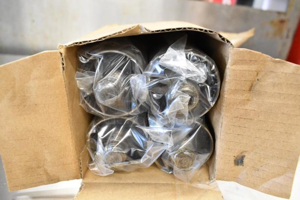 Box containing sealed components for Southbend PE36N-TTT griddle; new condition with packaging intact.
