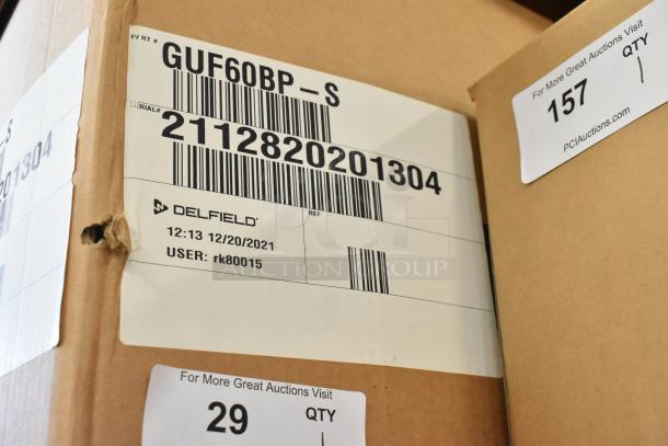 Brand new Delfield GUF60BP-S stainless steel commercial 2-door work top freezer in original box, 115 volts, 1 phase.