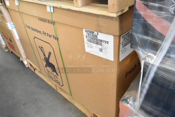 Brand new Delfield GUF60BP-S stainless steel 2-door worktop freezer in box, 115 volts, 1 phase, labeled for shipping.