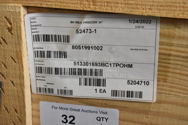 BKI 52473-1 stainless steel meat freezer, brand new in crate. Label details model, date, and equipment info. 115V, 1 Phase.
