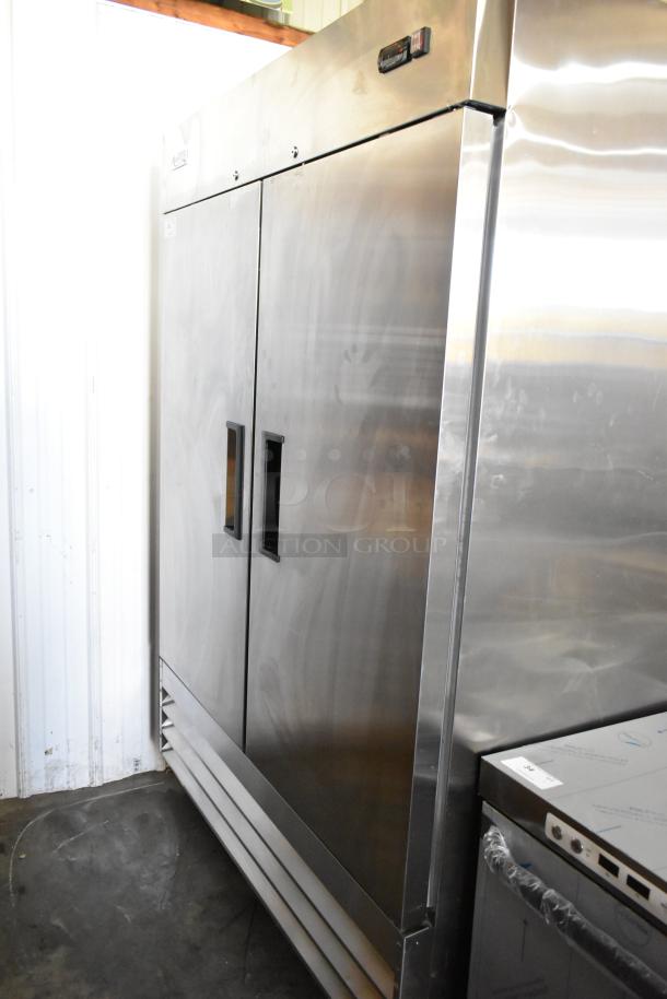 Brand new Avantco 178A49RHC stainless steel 2-door cooler with scratches, poly coated racks, and commercial casters.