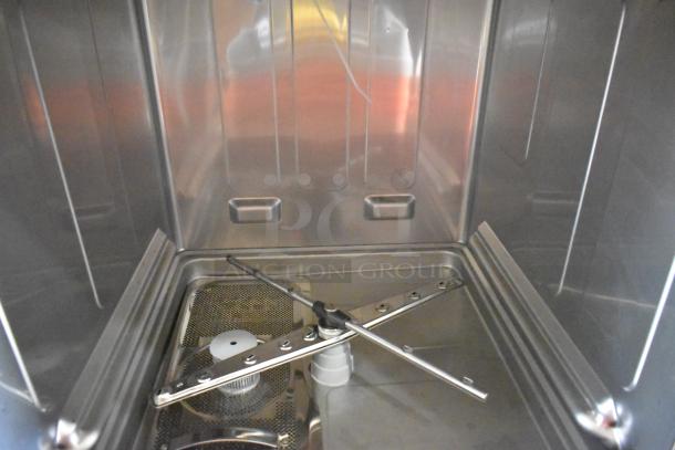 Brand new Mainstreet 541HTUC30 stainless steel high-temp undercounter dishwasher interior. 208/240V, 1 phase.