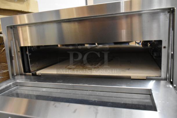 Avantco 177DPO18S stainless steel single deck countertop pizza/bakery oven with cooking stone, 120V, 1 phase. Brand new scratch and dent.
