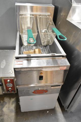 Brand new 2023 Avantco 177EF40D stainless steel commercial deep fat fryer with two metal baskets and visible warning labels.