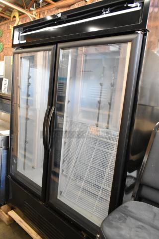 Mainstreet 829GMC49B metal 2-door commercial cooler, brand new, with poly coated racks, 115V, 1 phase, minor scratches.