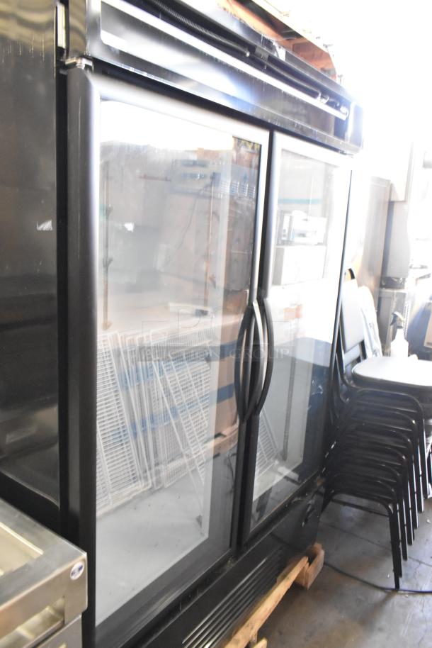 Brand new Mainstreet 829GMC49B metal 2-door reach-in cooler merchandiser, scratch and dent, poly coated racks.