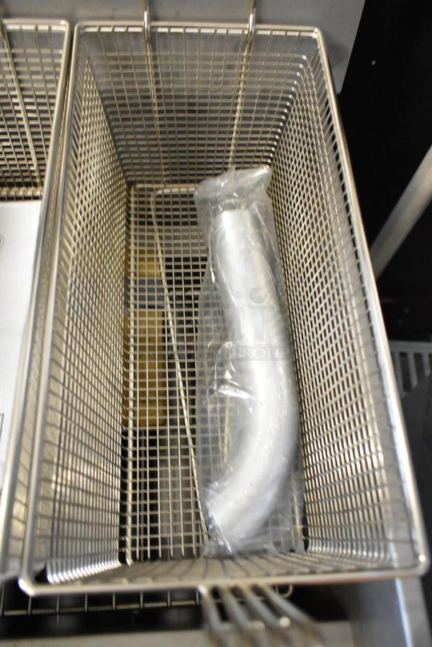 Brand new 2025 Pitco Frialator 40D fryer baskets, stainless steel, in excellent condition.