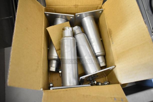 Cardboard box containing stainless steel components, possibly for Pitco Frialator 40D fryer assembly. Components appear new.